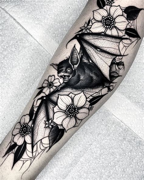 bat and flowers tattoo|bat tattoos images.